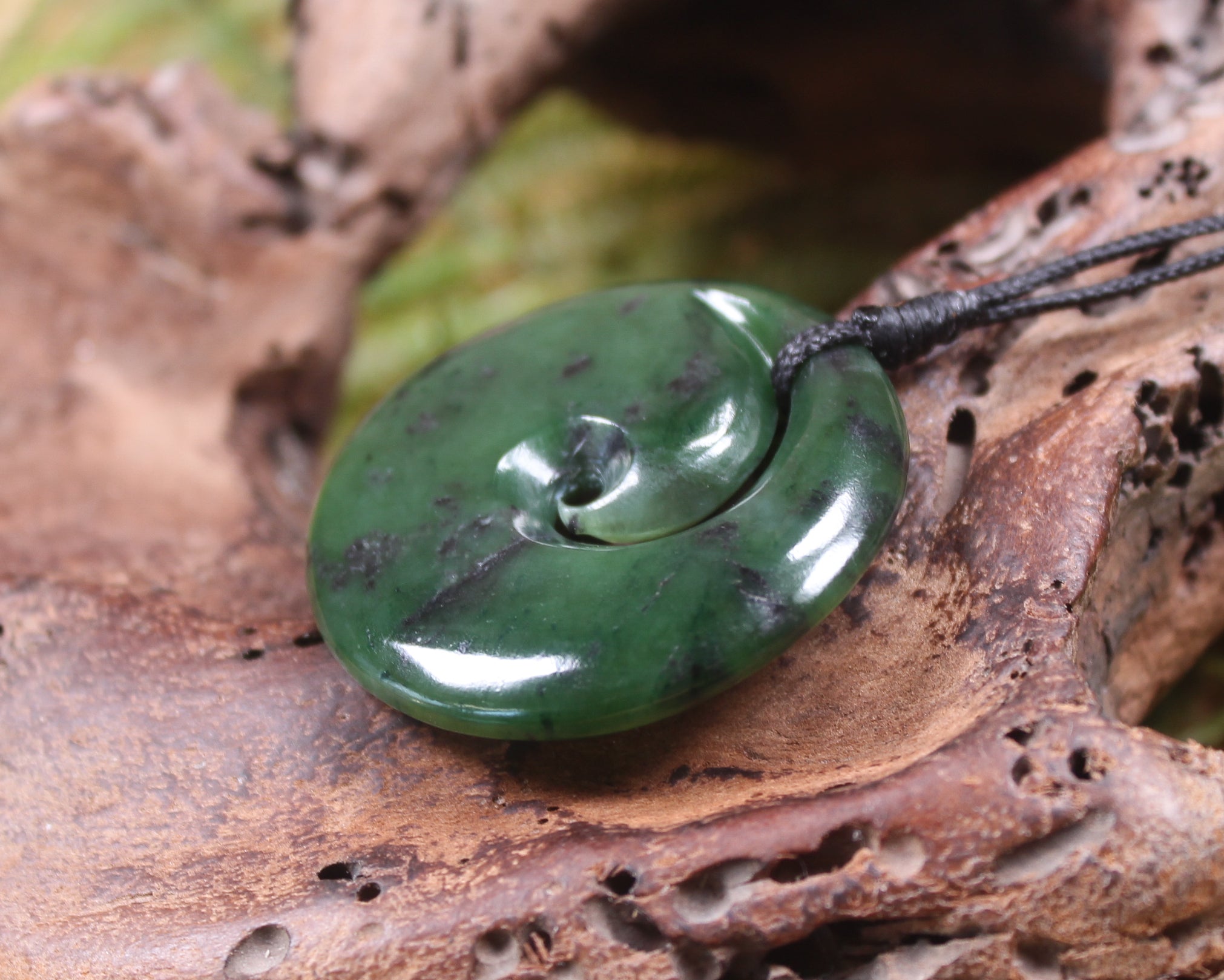 Koru carved from Rimu Pounamu - NZ Greenstone