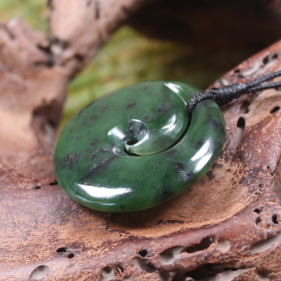 Koru carved from Rimu Pounamu - NZ Greenstone