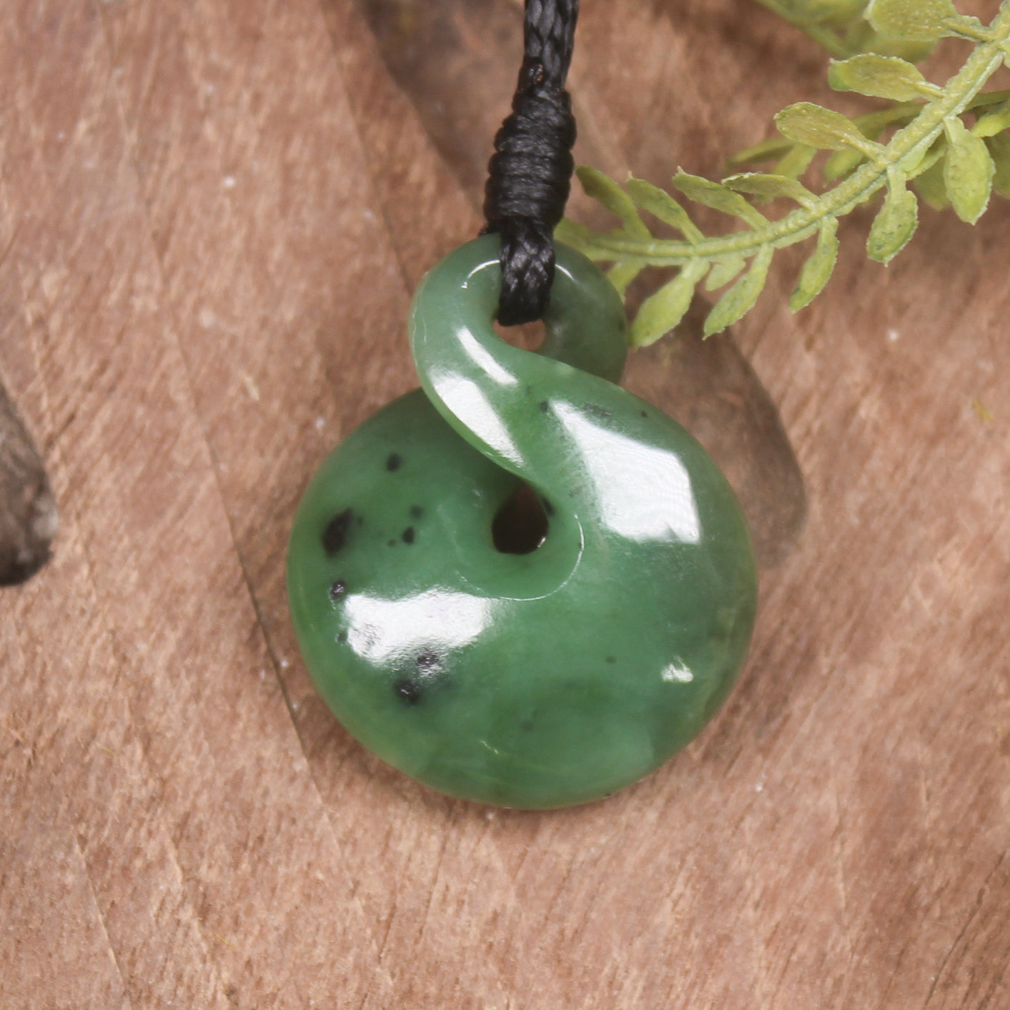 Twist or Pikorua carved from Hapopo Pounamu - NZ Greenstone