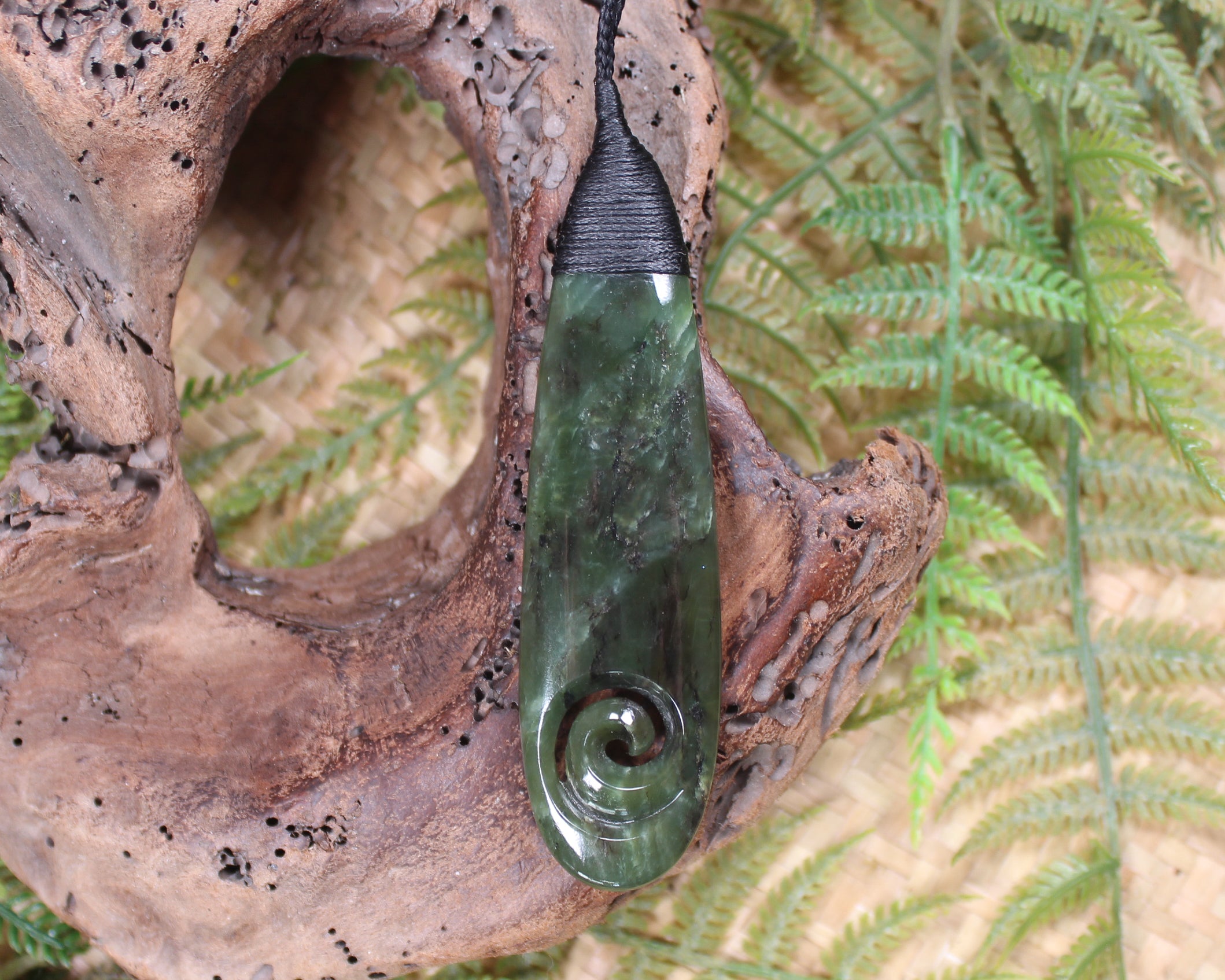 Roimata or Teardop with Koru carved from Rimu Pounamu - NZ Greenstone