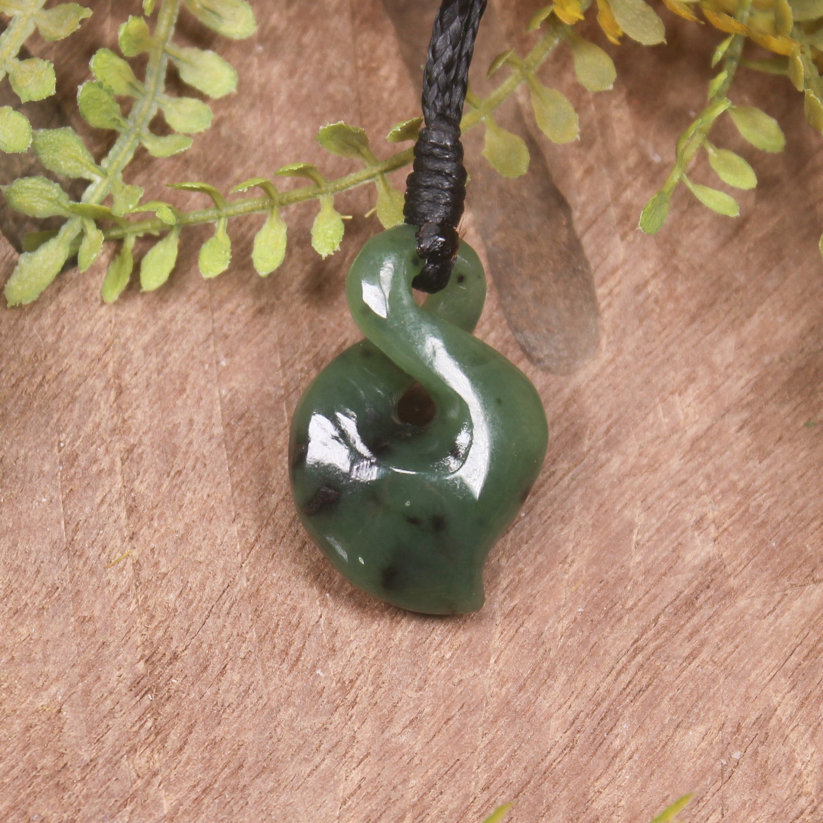 Twist or Pikorua carved from Hapopo Pounamu - NZ Greenstone