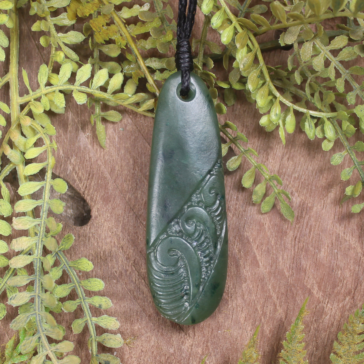 Roimata or Teardrop with Koru carved from Kawakawa Pounamu - NZ Greenstone