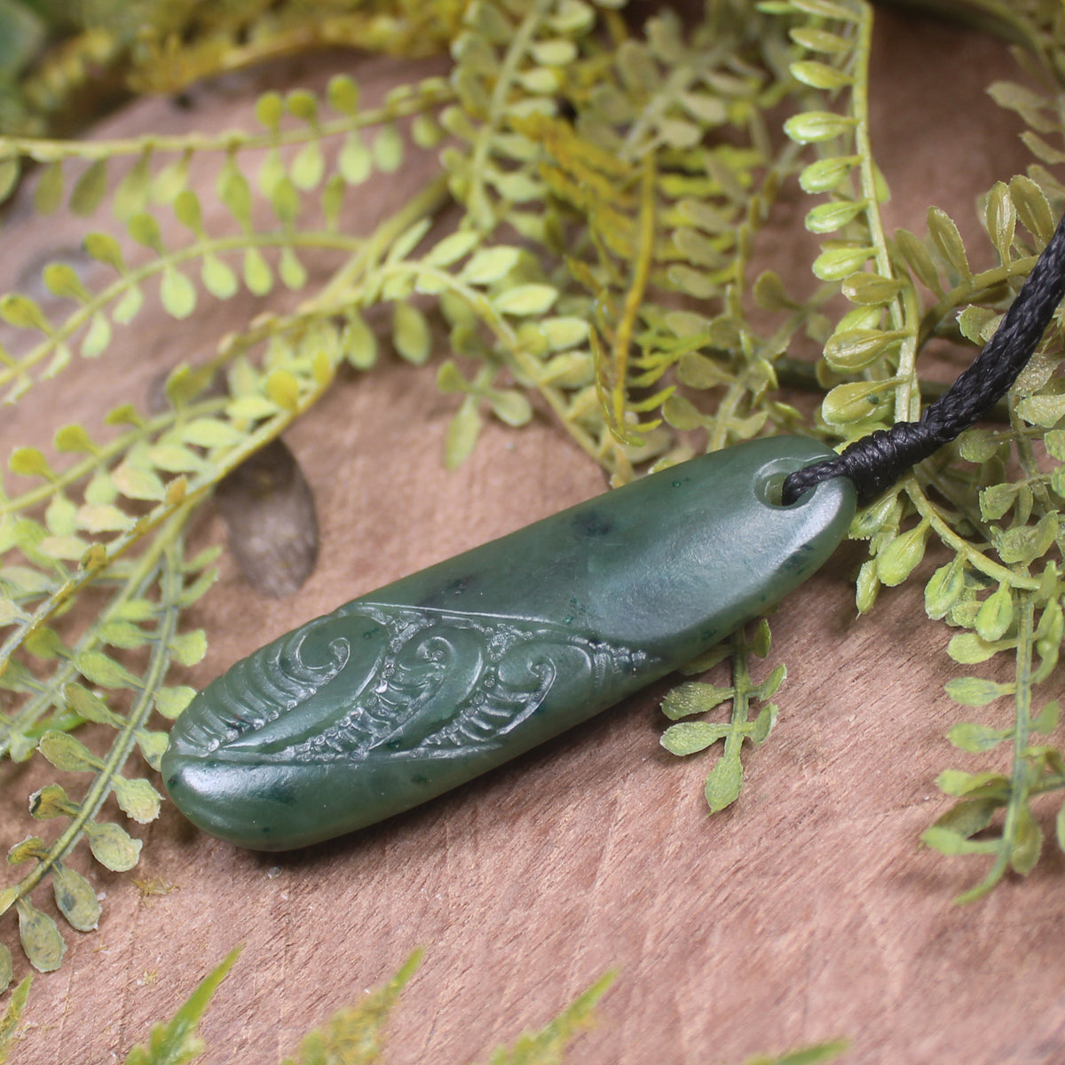 Roimata or Teardrop with Koru carved from Kawakawa Pounamu - NZ Greenstone