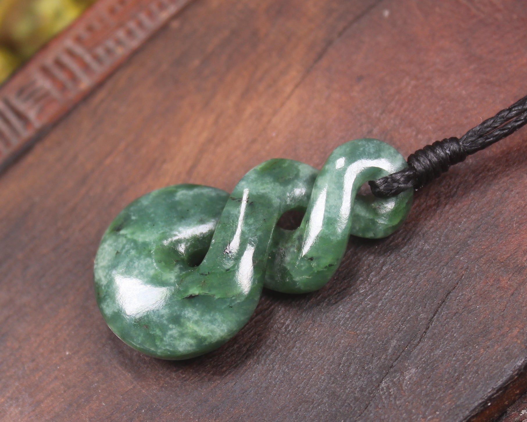 Twist carved from Kawakawa Pounamu - NZ Greenstone