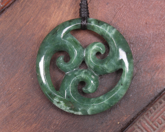 Koru pendant carved from Kawakawa Pounamu - NZ Greenstone