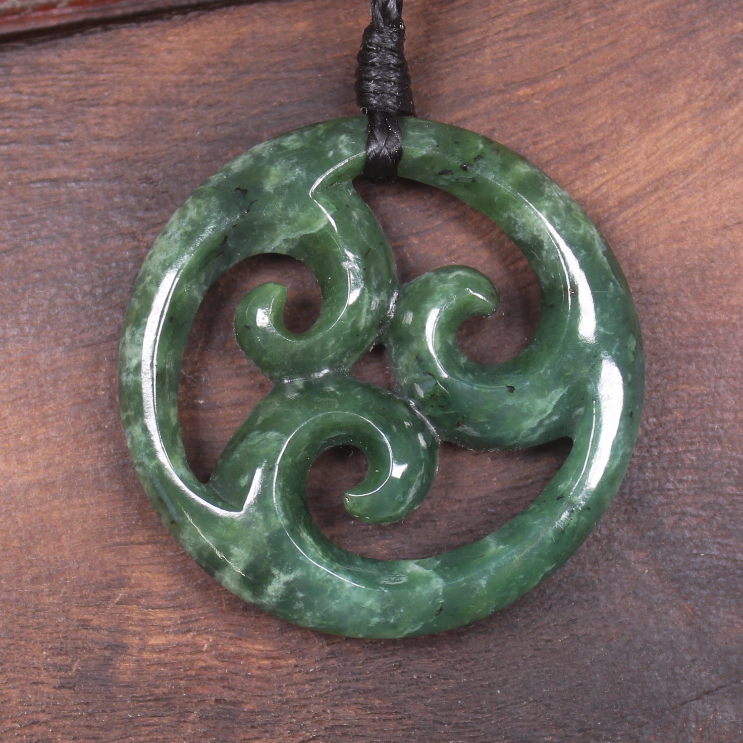 Koru pendant carved from Kawakawa Pounamu - NZ Greenstone