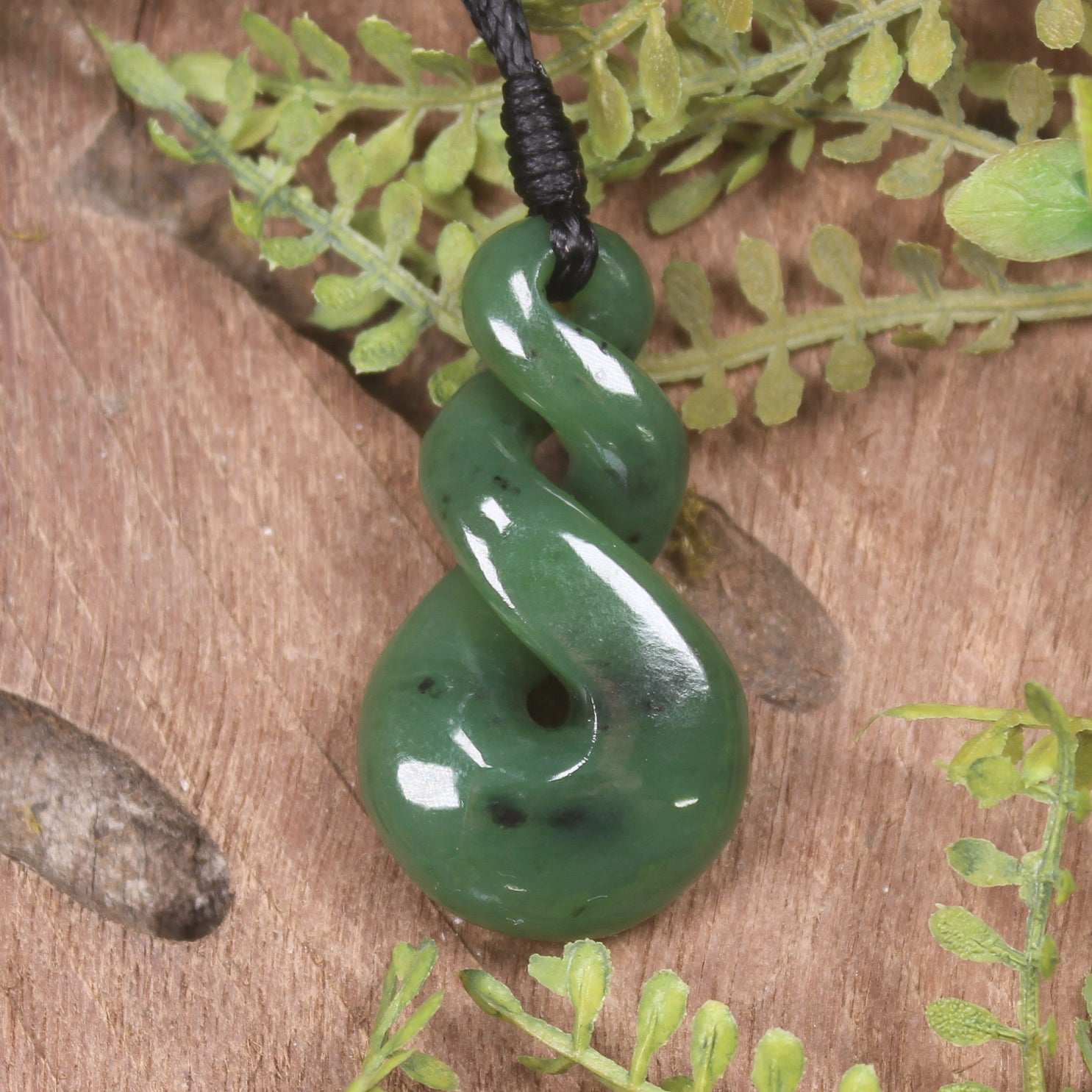 Twist or Pikorua carved from Hapopo Pounamu - NZ Greenstone