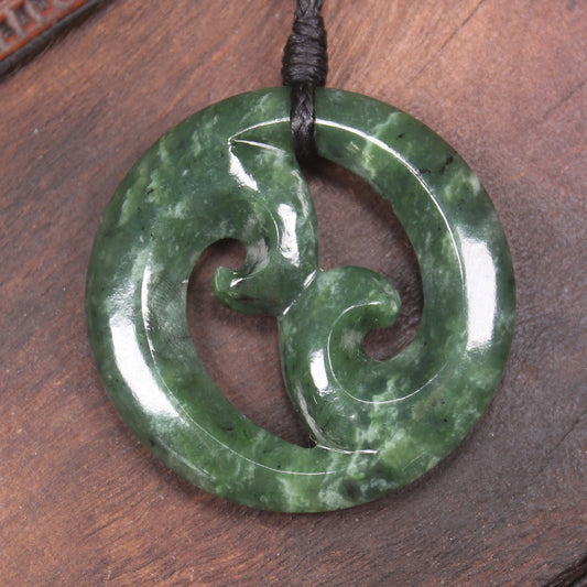 Koru pendant carved from Kawakawa Pounamu - NZ Greenstone