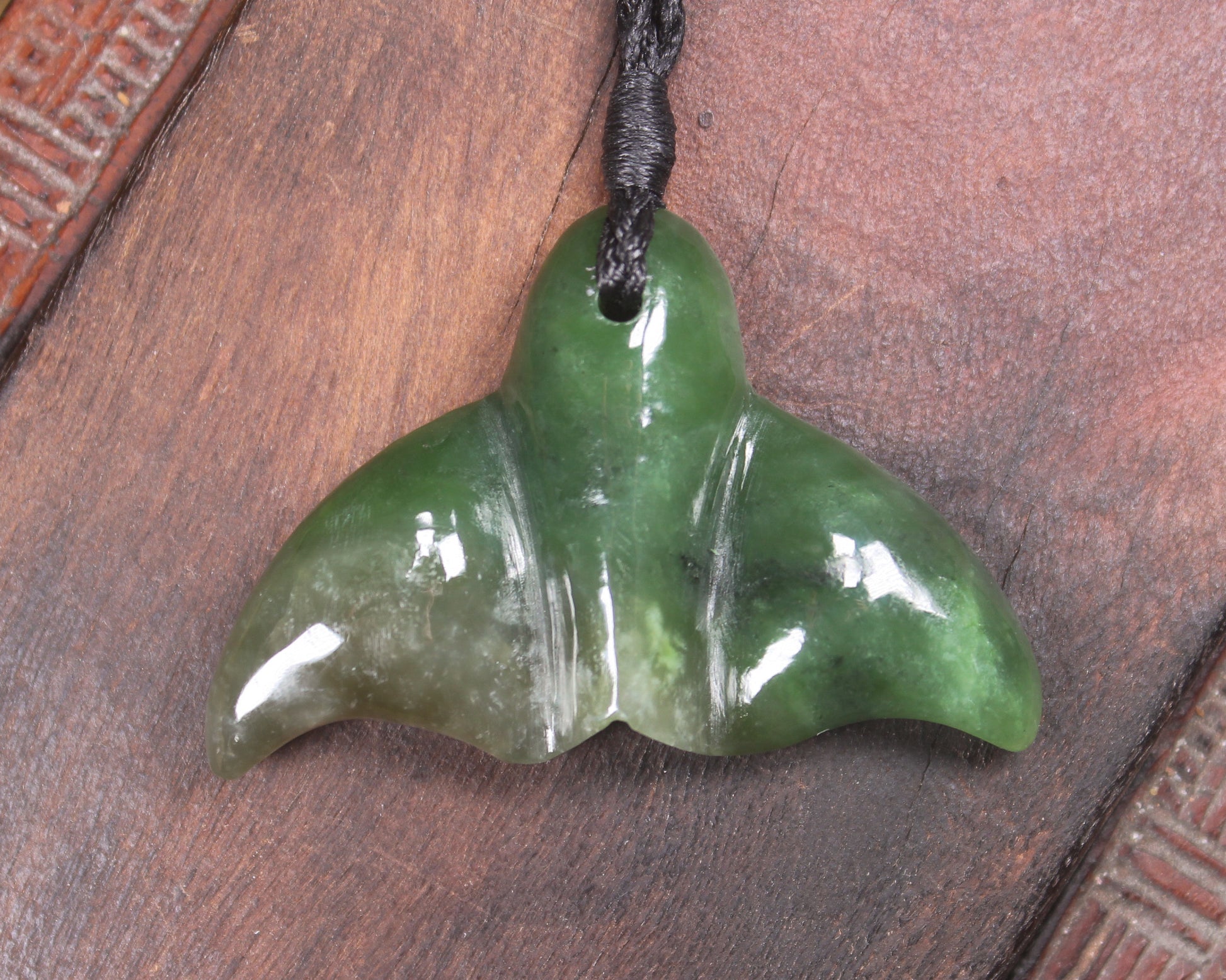 Whale tail carved from Hapopo Pounamu - NZ Greenstone
