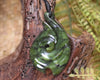 Douglas Creek pounamu hei matau pendant - NZ Greenstone