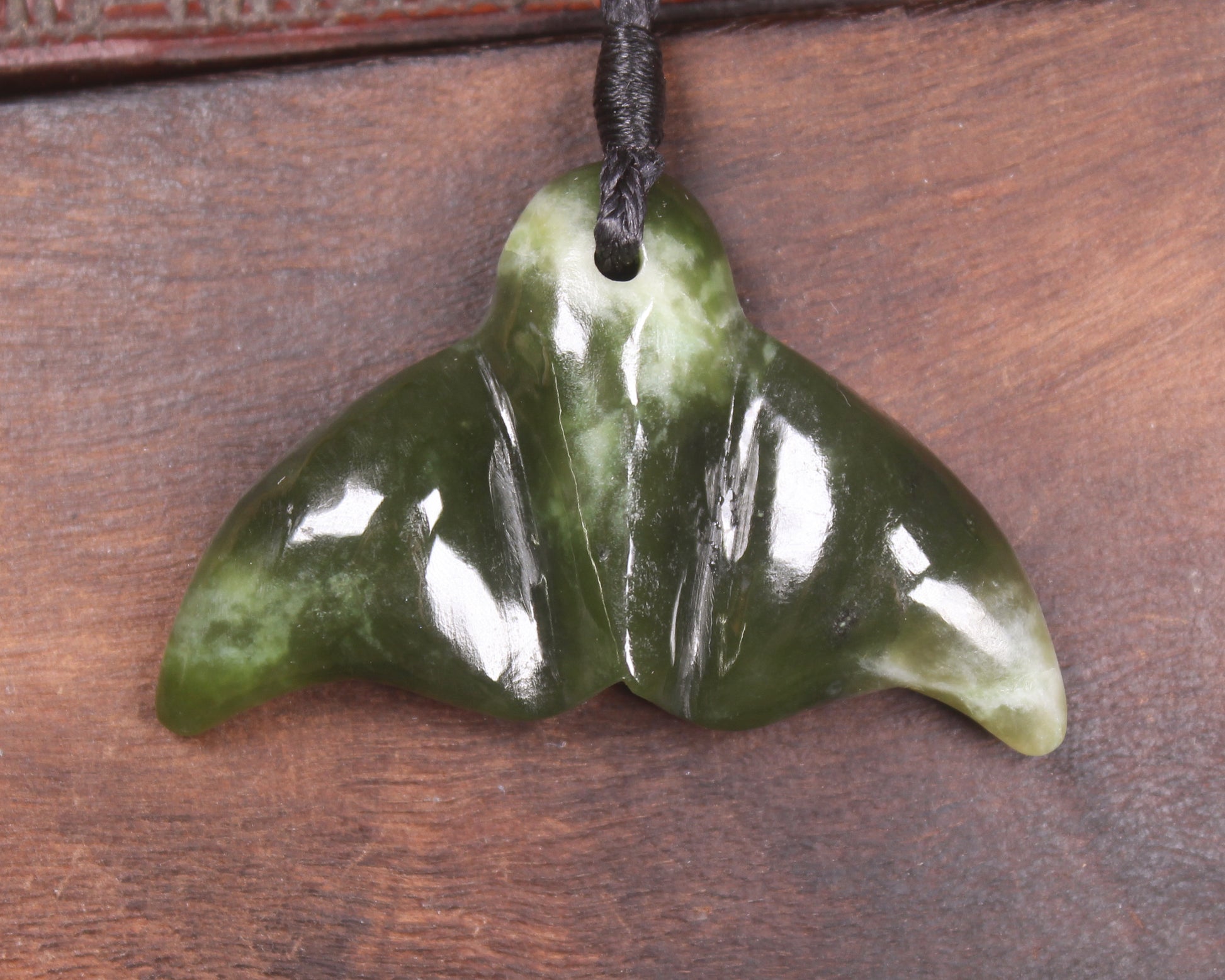 Whale Tail carved from Rimu Pounamu - NZ Greenstone