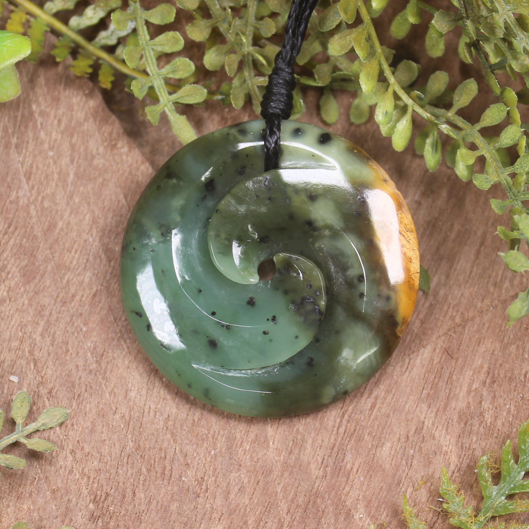 Koru carved from Raukaraka Pounamu - NZ Greenstone