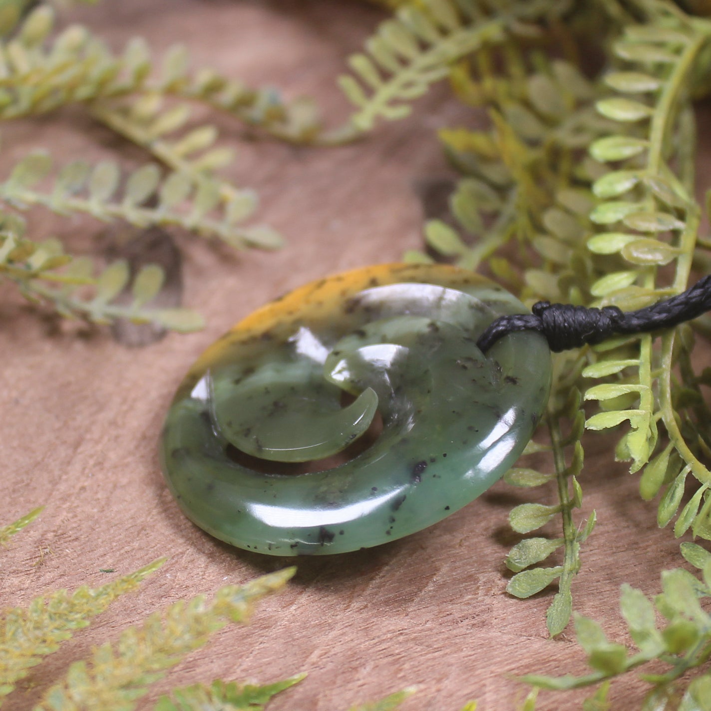 Koru carved from Flower Jade Pounamu - NZ Greenstone
