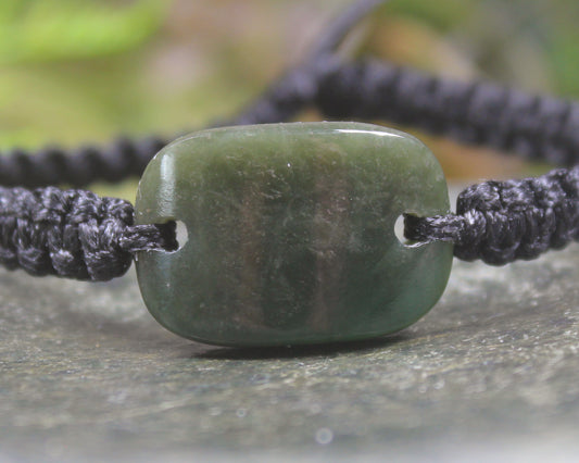 Adjustable cord bracelet with Rimu Pounamu