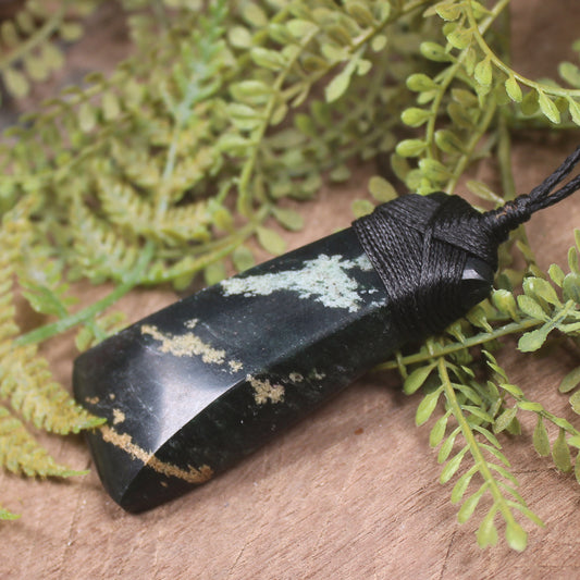 Serpentine Pounamu carved into a Toki Pendant - NZ Greenstone