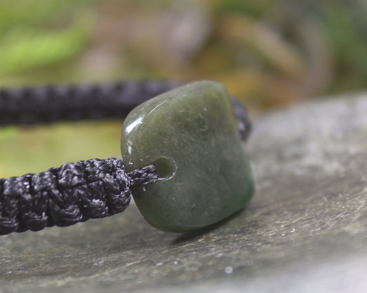 Adjustable cord bracelet with Rimu Pounamu