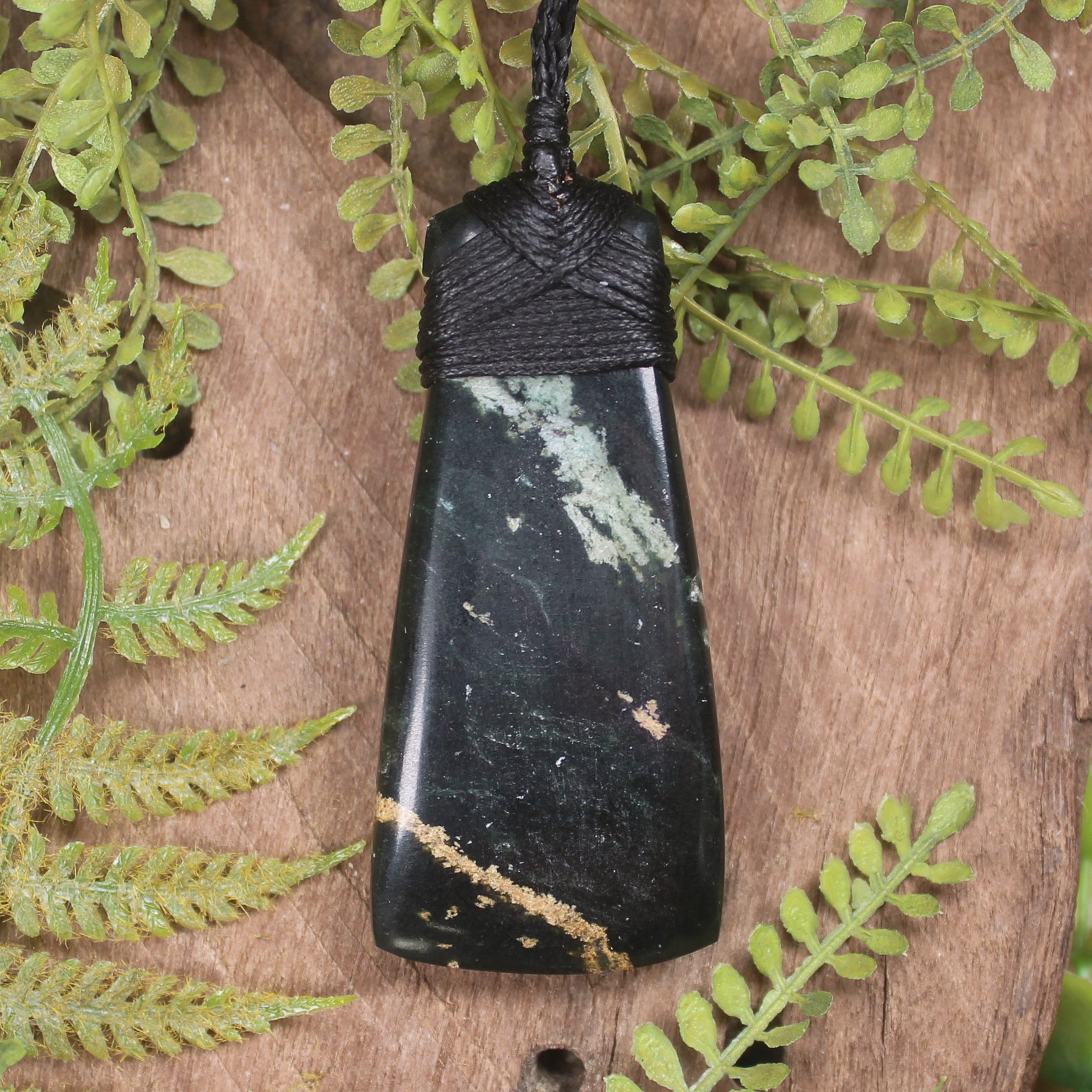 Serpentine Pounamu carved into a Toki Pendant - NZ Greenstone