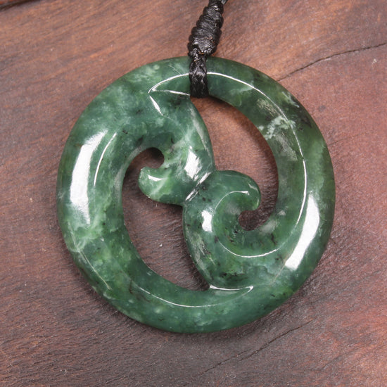 Koru pendant carved from Kawakawa Pounamu - NZ Greenstone