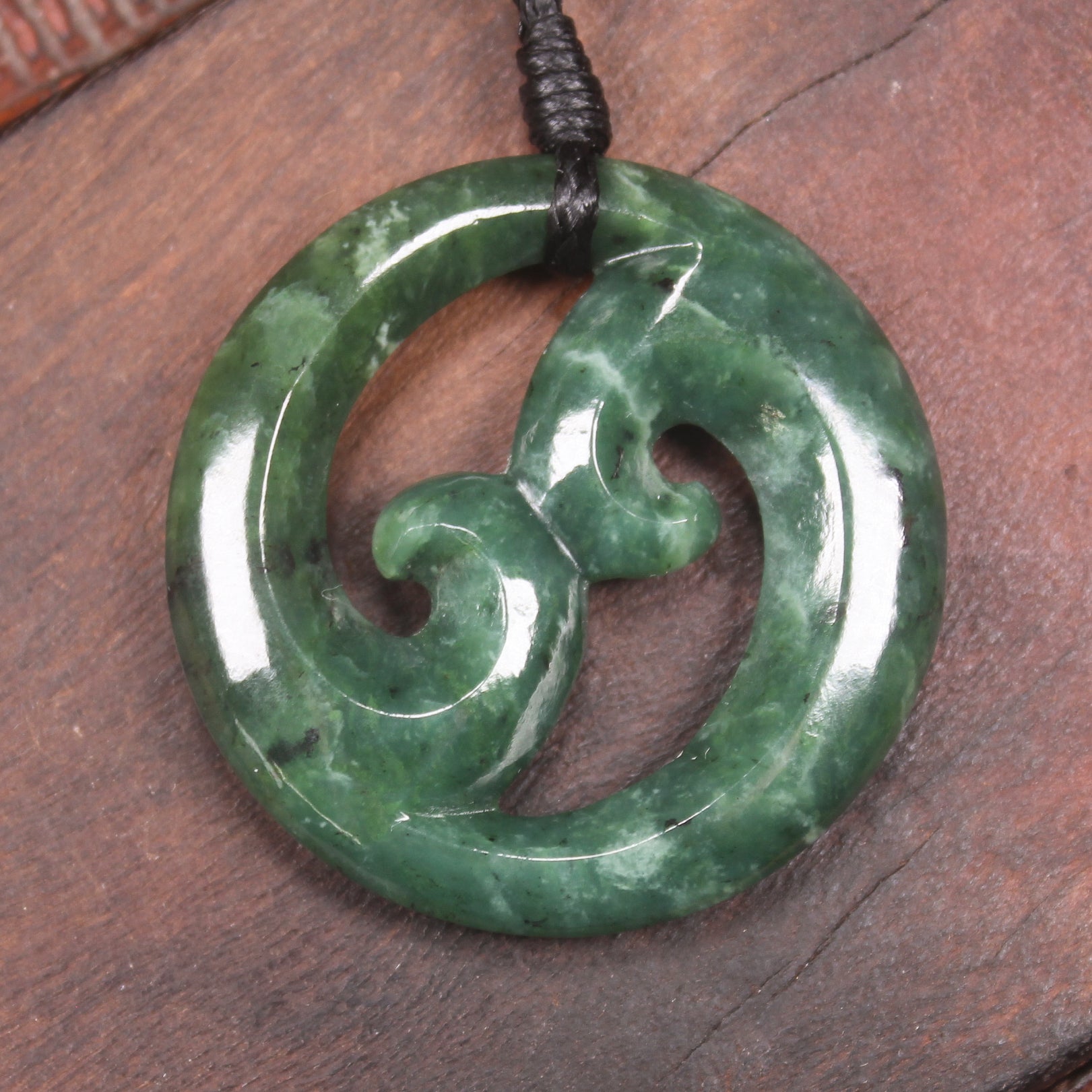 Koru pendant carved from Kawakawa Pounamu - NZ Greenstone