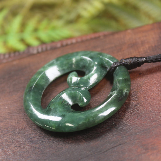 Koru pendant carved from Kawakawa Pounamu - NZ Greenstone