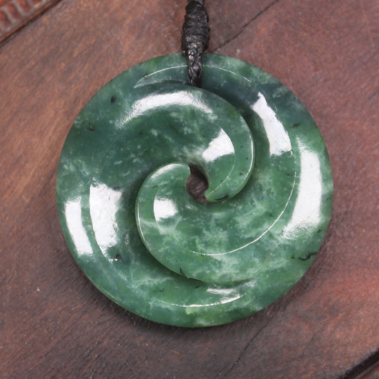 Koru pendant carved from Kawakawa Pounamu - NZ Greenstone