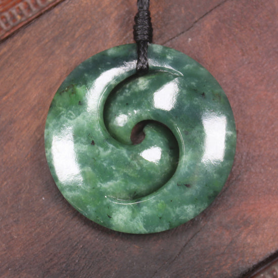 Koru pendant carved from Kawakawa Pounamu - NZ Greenstone