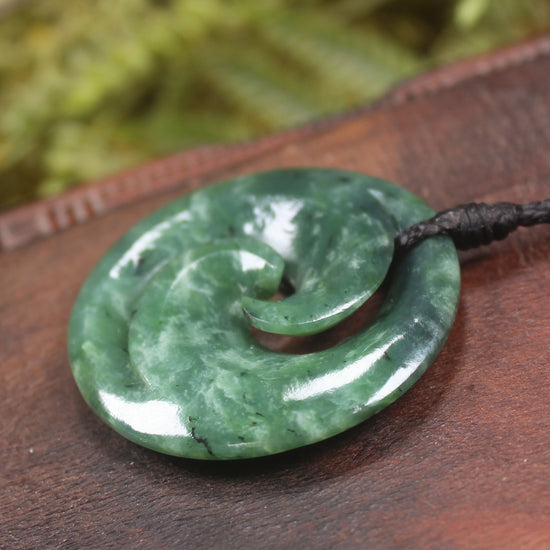 Koru pendant carved from Kawakawa Pounamu - NZ Greenstone