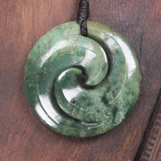 Koru pendant carved from Kawakawa Pounamu - NZ Greenstone
