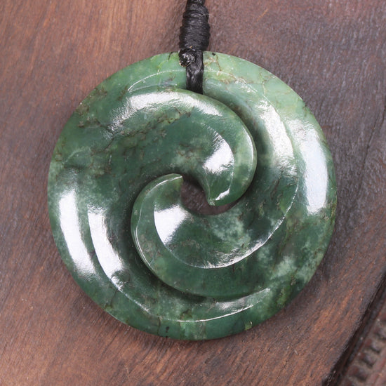 Koru pendant carved from Kawakawa Pounamu - NZ Greenstone