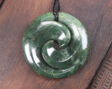 Koru pendant carved from Kawakawa Pounamu - NZ Greenstone