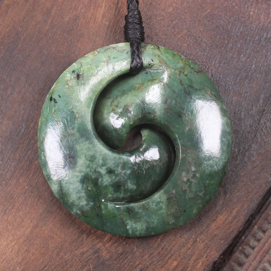 Koru pendant carved from Kawakawa Pounamu - NZ Greenstone