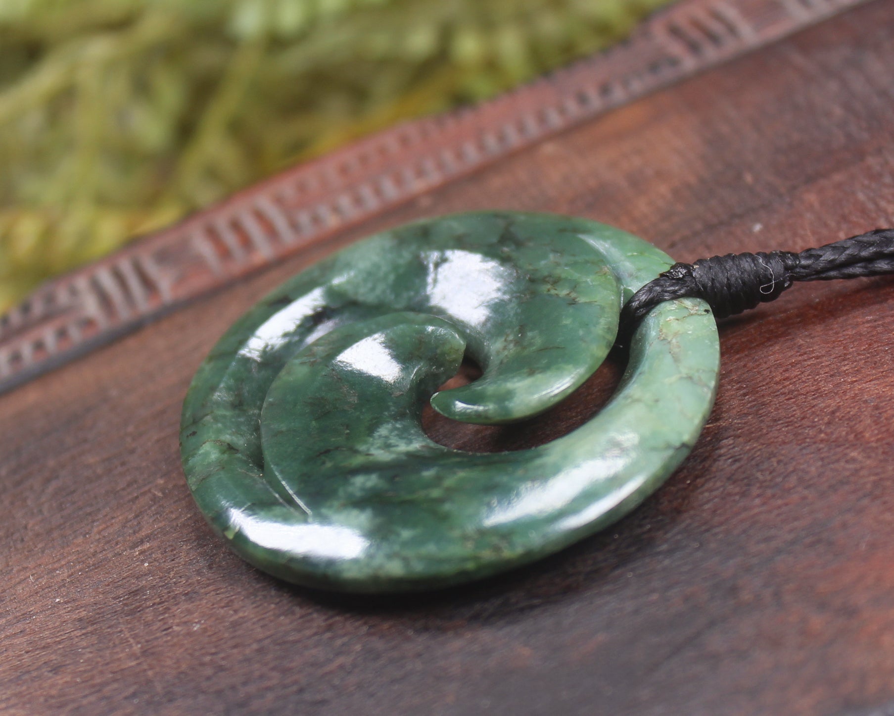 Koru pendant carved from Kawakawa Pounamu - NZ Greenstone