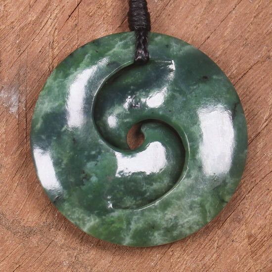Koru pendant carved from Kawakawa Pounamu - NZ Greenstone