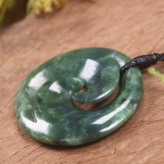 Koru pendant carved from Kawakawa Pounamu - NZ Greenstone