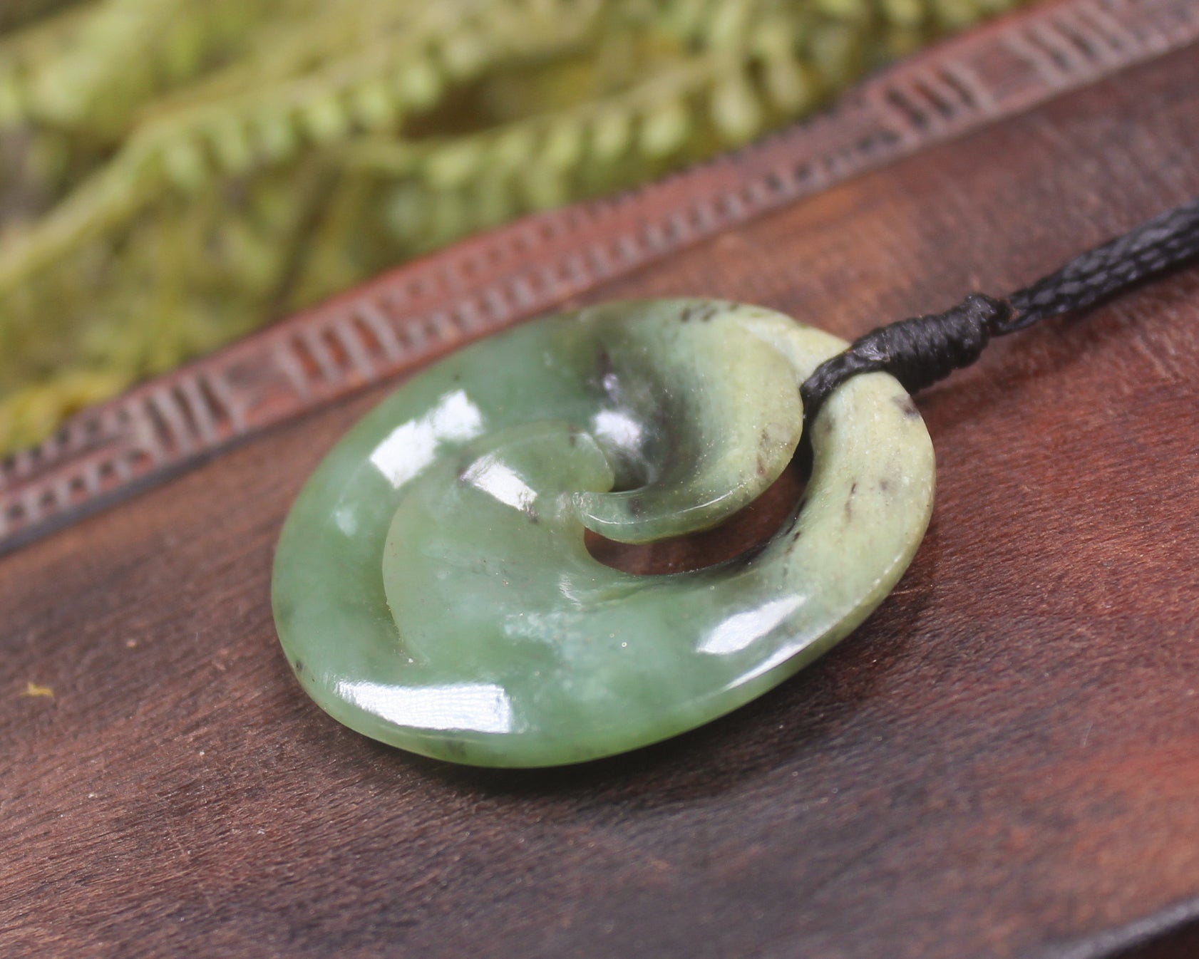 Koru carved from Hapopo Pounamu - NZ Greenstone