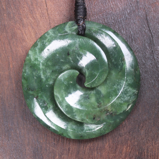 Koru pendant carved from Kawakawa Pounamu - NZ Greenstone