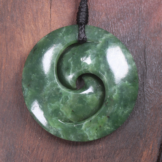 Koru pendant carved from Kawakawa Pounamu - NZ Greenstone