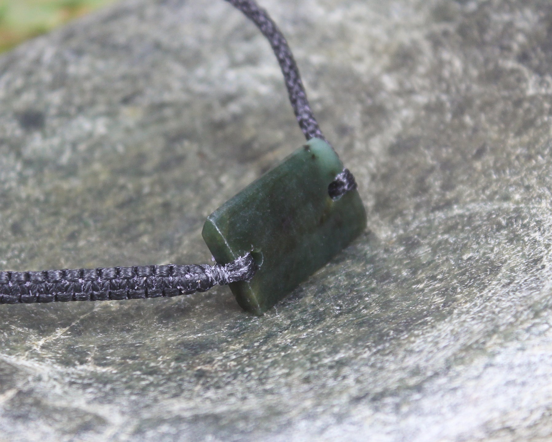 Adjustable cord bracelet with Rimu Pounamu