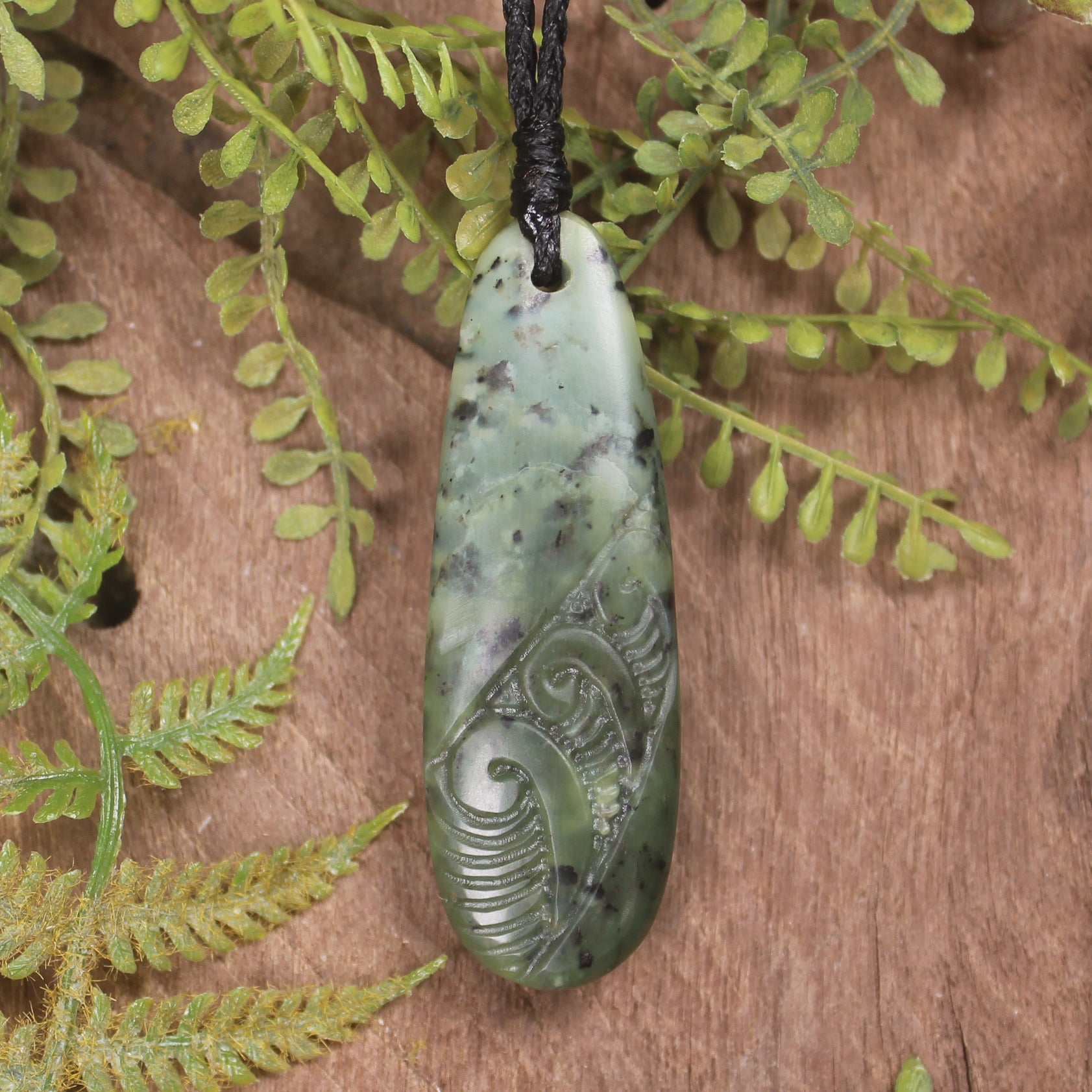 Roimata or Teardop with Koru carved from Rimu Pounamu - NZ Greenstone