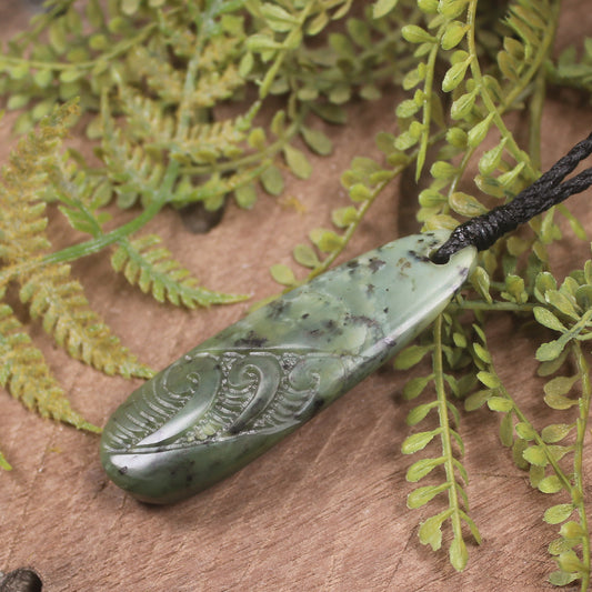 Roimata or Teardop with Koru carved from Rimu Pounamu - NZ Greenstone