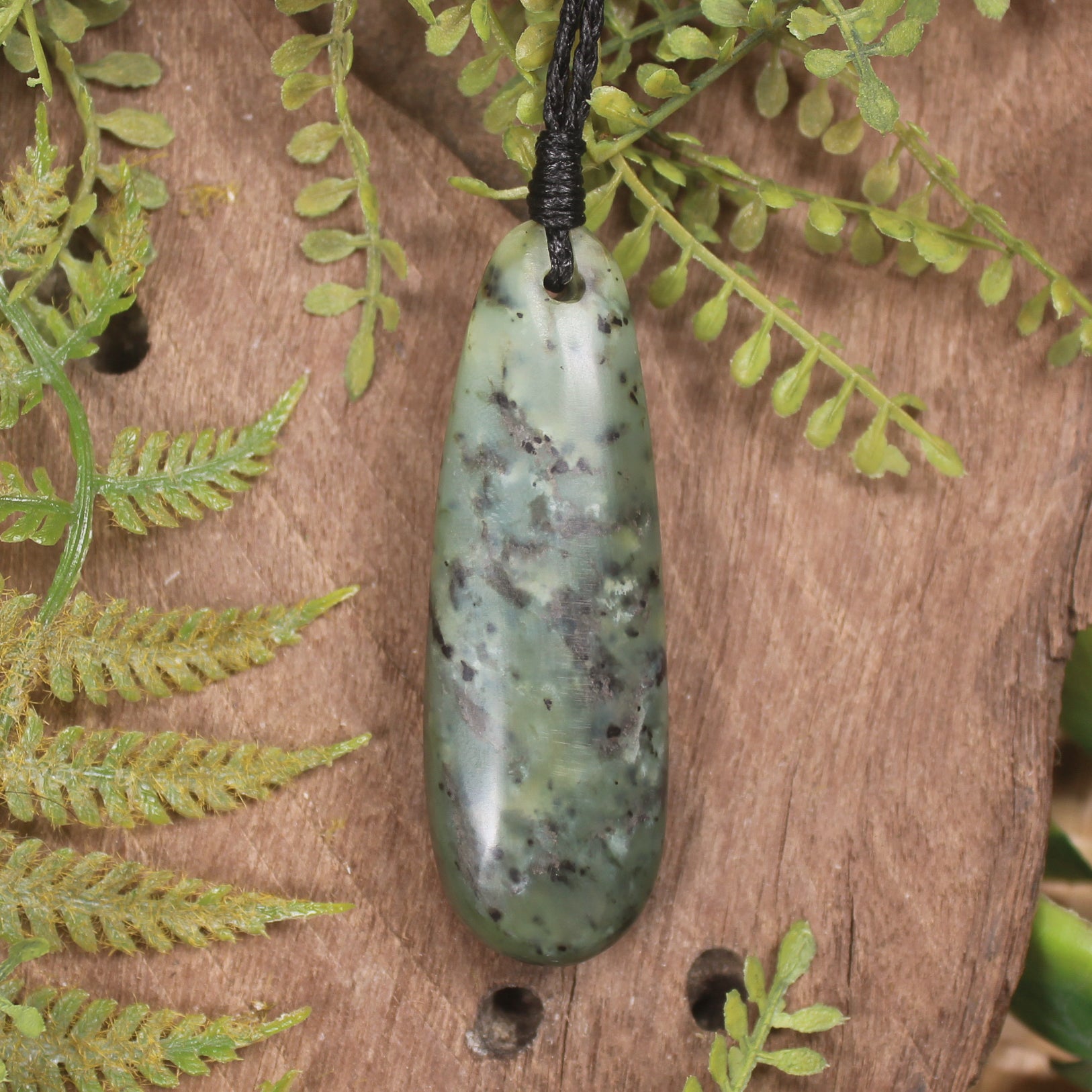 Roimata or Teardop with Koru carved from Rimu Pounamu - NZ Greenstone