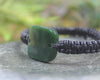 Adjustable cord bracelet with Kawakawa Pounamu
