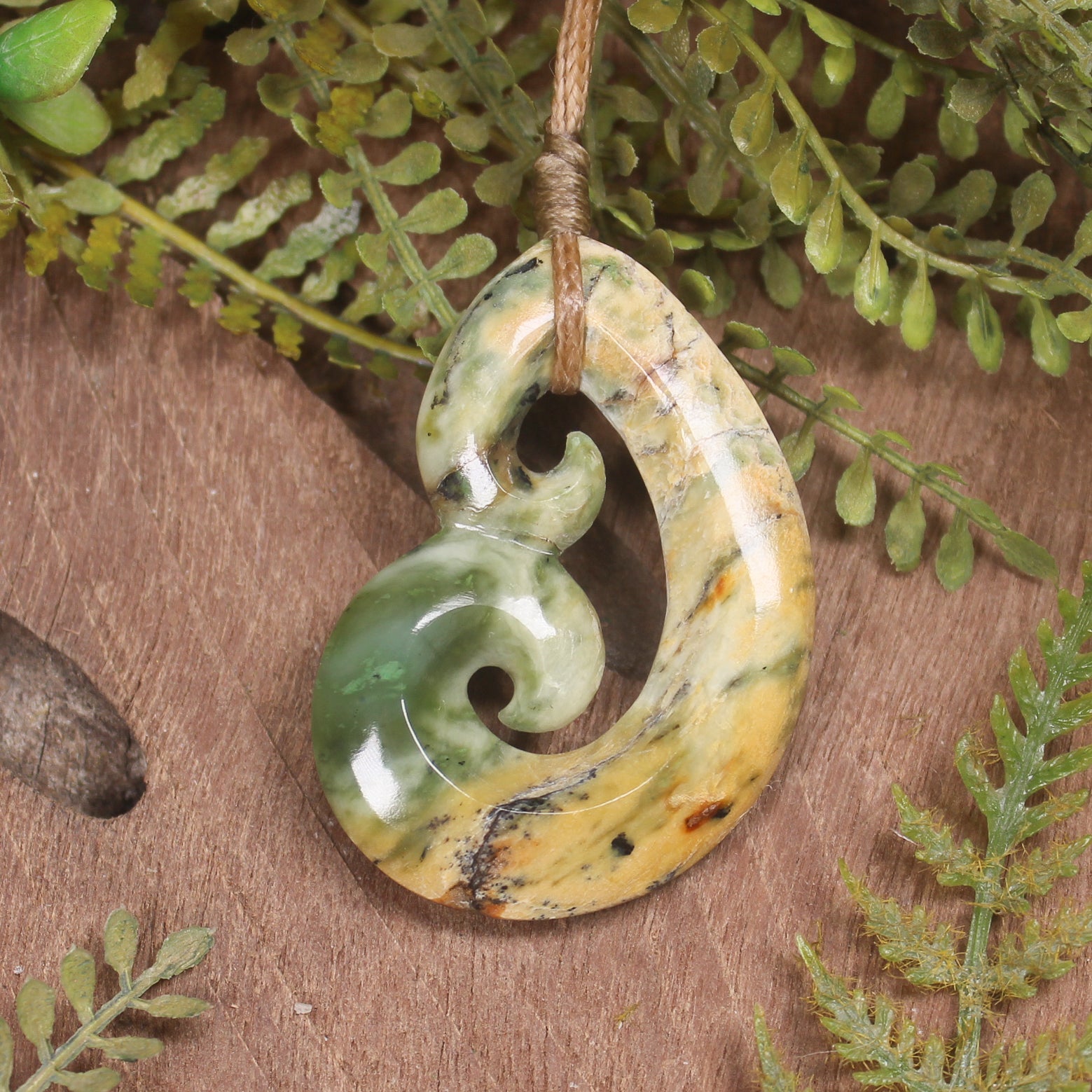 Koru carved from Raukaraka Pounamu - NZ Greenstone