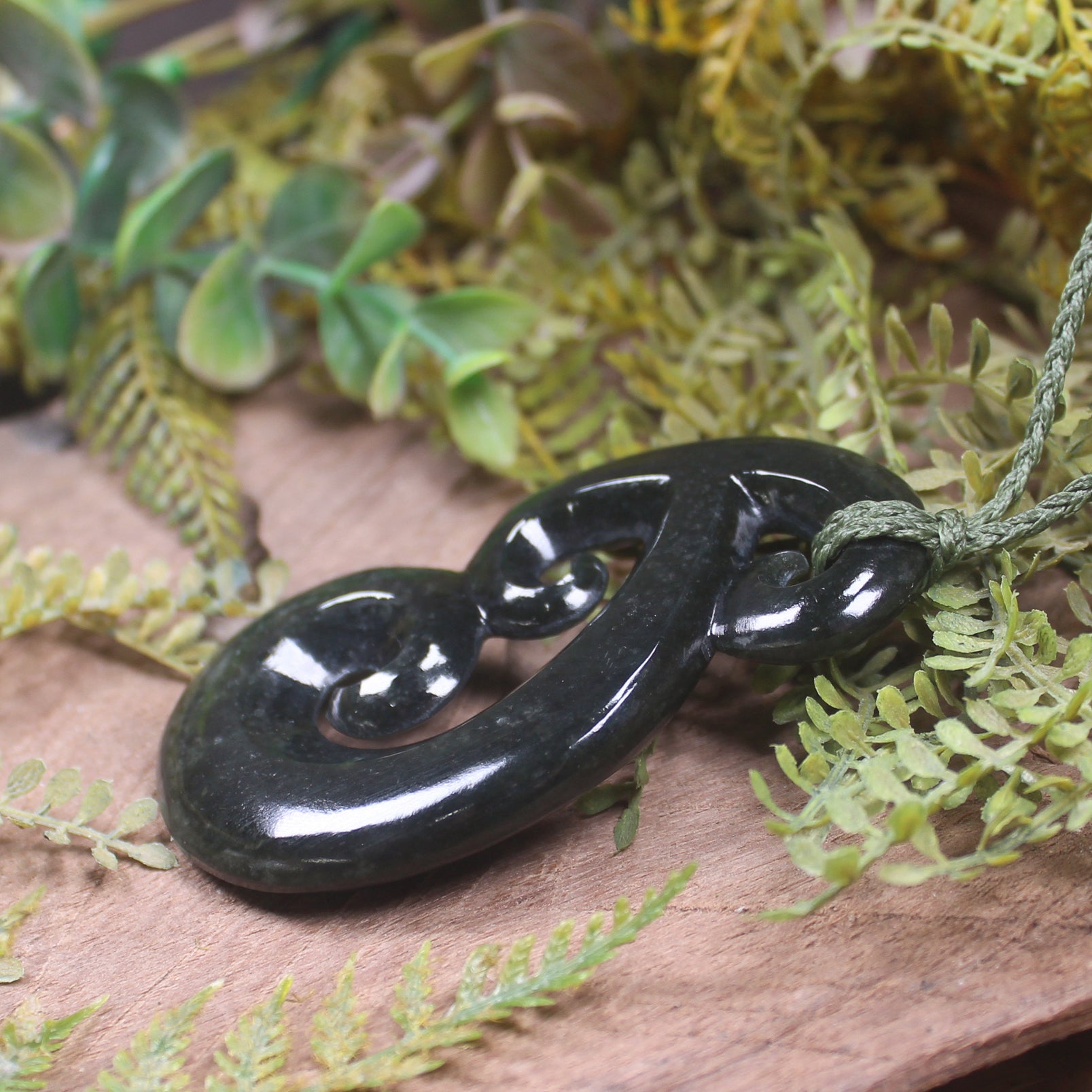 Hammerhead pendant carved from Rimu Pounamu - NZ Greenstone