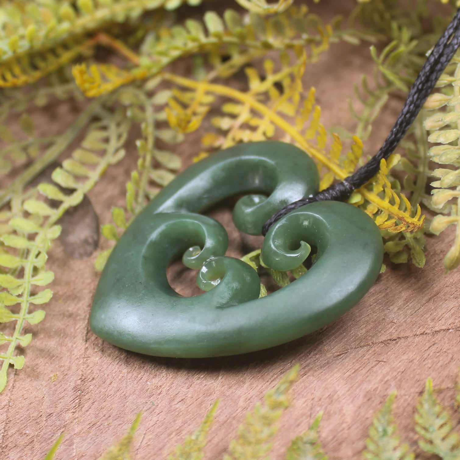 Heart with Koru carved from Hapopo Pounamu - NZ Greenstone