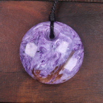 Porowhita carved from Russian Charoite