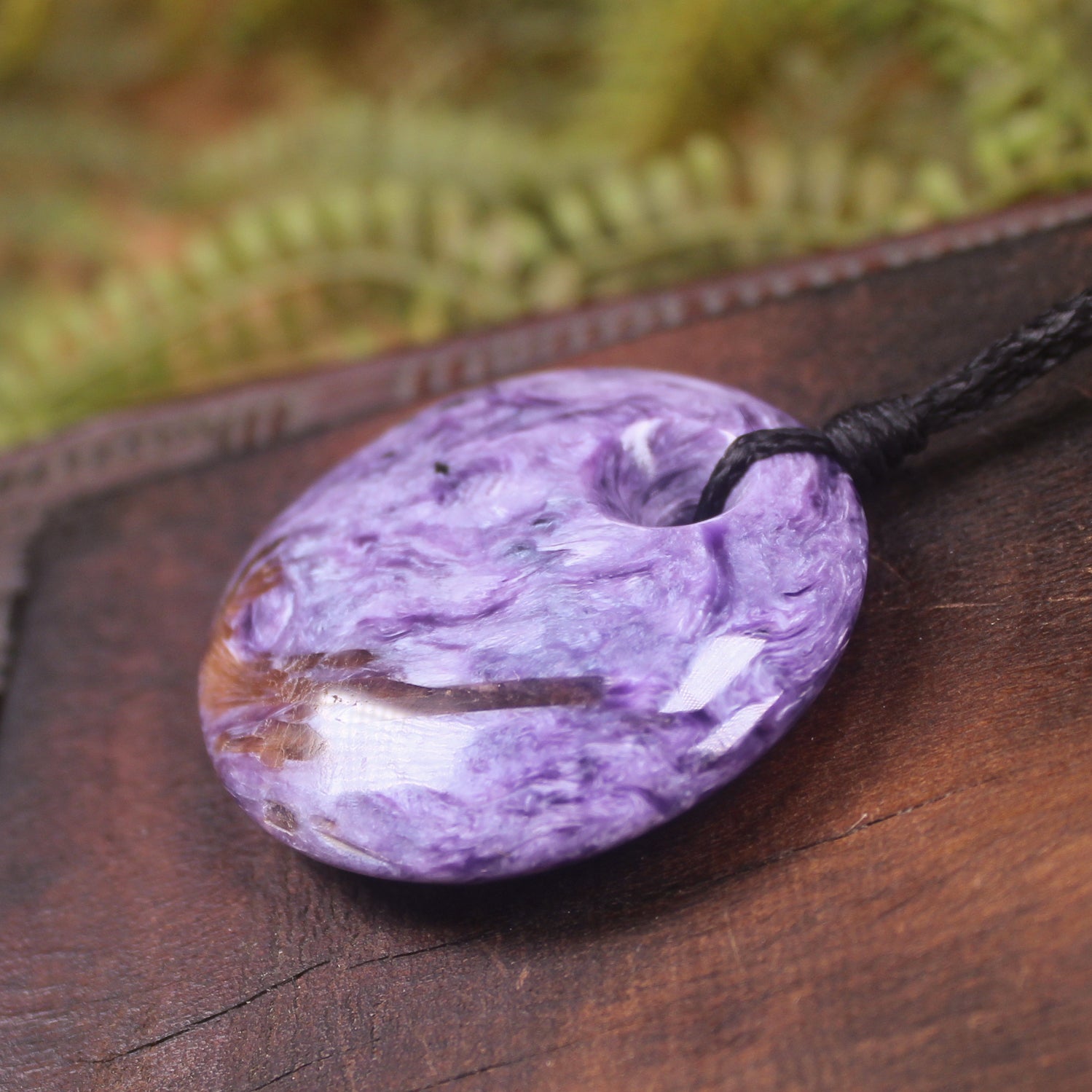 Porowhita carved from Russian Charoite