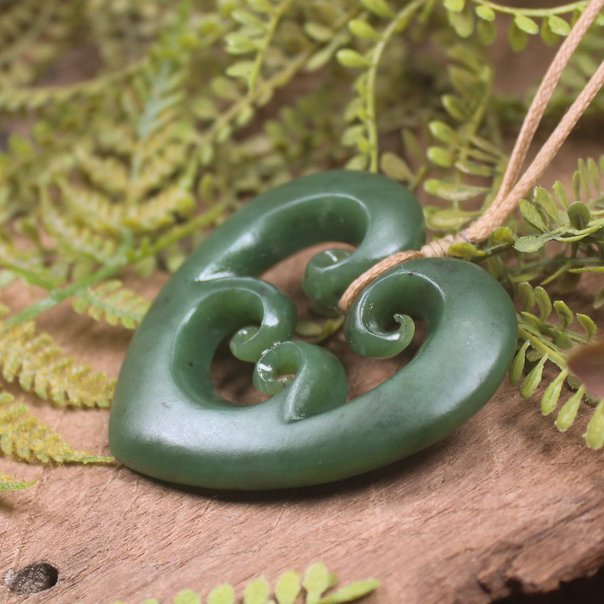 Heart with Koru carved from Hapopo Pounamu - NZ Greenstone
