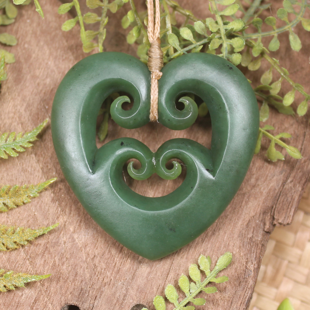 Heart with Koru carved from Hapopo Pounamu - NZ Greenstone