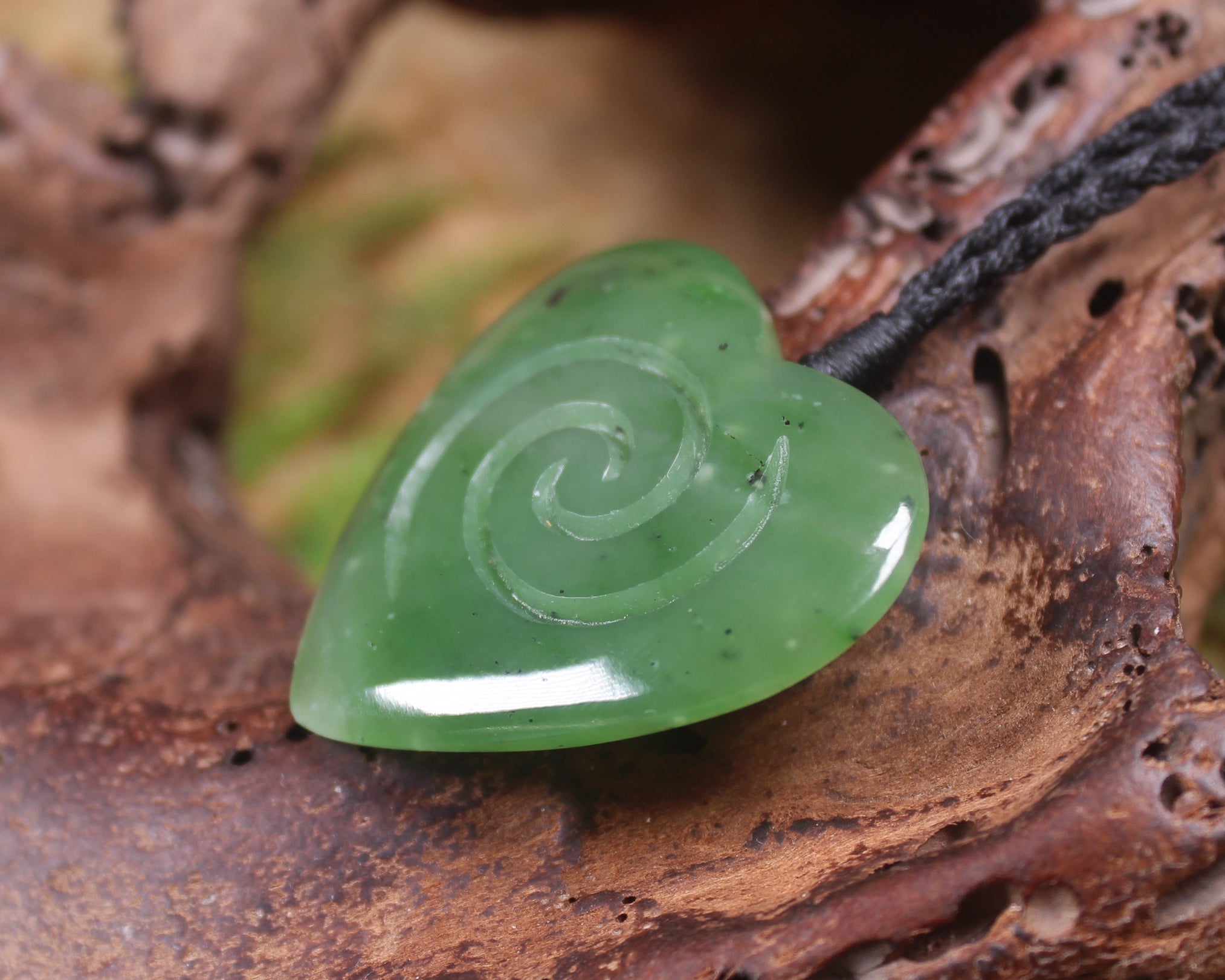 Heart with Koru carved from Hapopo Pounamu - NZ Greenstone